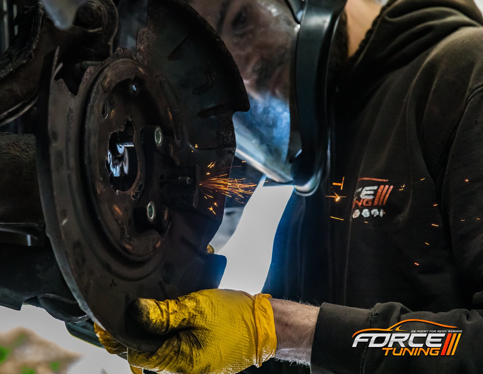 Professional automotive service equipment and workspace at Force Tuning for ECU remapping, AdBlue services, and vehicle diagnostics